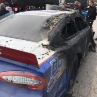 Brian Finney extinguishes his own fire at Toledo Speedway