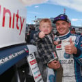 Kyle Larson and his son in victory lane