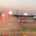 Eagle Raceway helicopter - official struck by race car