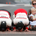 Brad Keselowski kisses the bricks at Indianapolis Motor Speedway