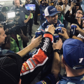 Elliott Sadler shares beer with his crew after his final NASCAR race