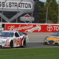 Carl Edwards leads Erik Darnell at the Milwaukee Mile