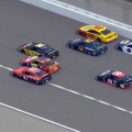 5 wide for the lead at Kansas Speedway