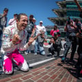 Helio Castroneves kisses bricks at Indianapolis Motor Speedway - Indy 500