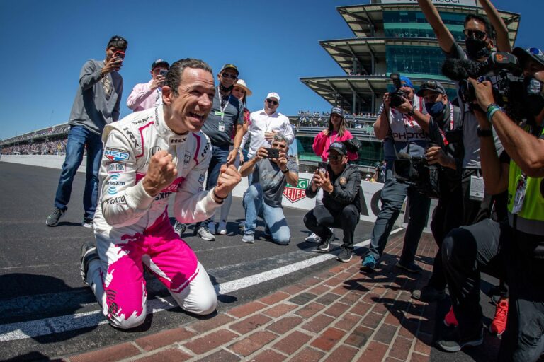 Helio Castroneves kisses bricks at Indianapolis Motor Speedway - Indy 500