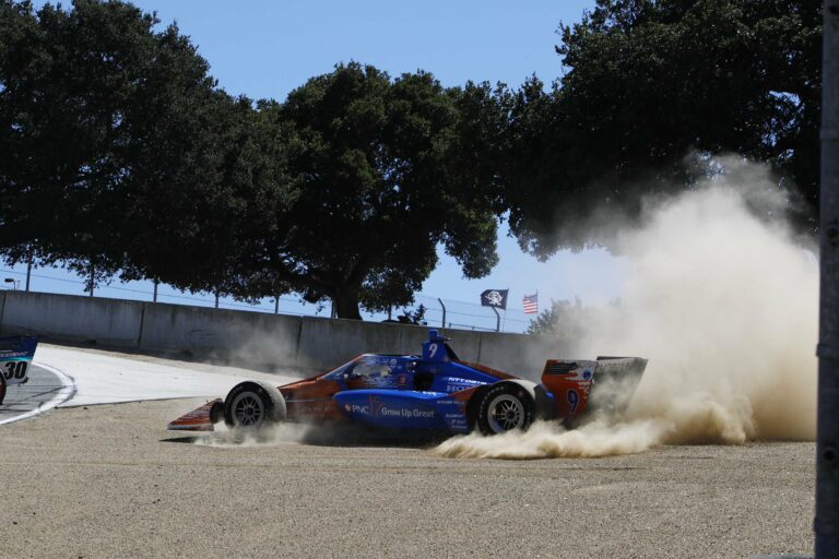 Scott Dixon in dirt at Laguna Seca - Indycar Series