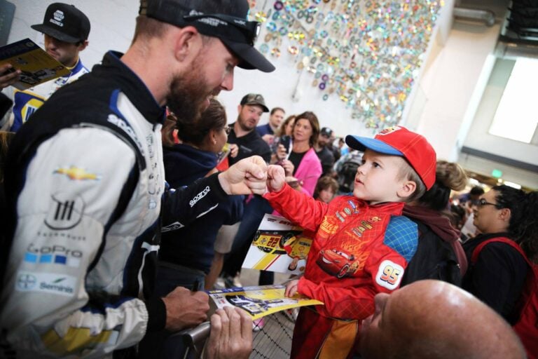 NASCAR driver Ross Chastain signs autographs