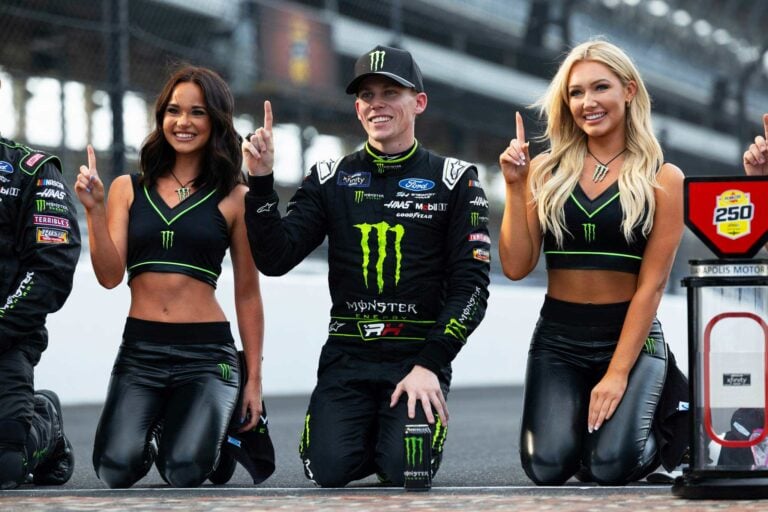 Riley Herbst with Monster Energy Girls - Indianapolis Motor Speedway - - Pennzoil 250 Presented by Advanced Auto Parts - By_ Titus Slaughter (1)